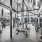 Large fitness center with large windows and plenty of equipment
