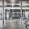 Large fitness center with large windows and plenty of equipment
